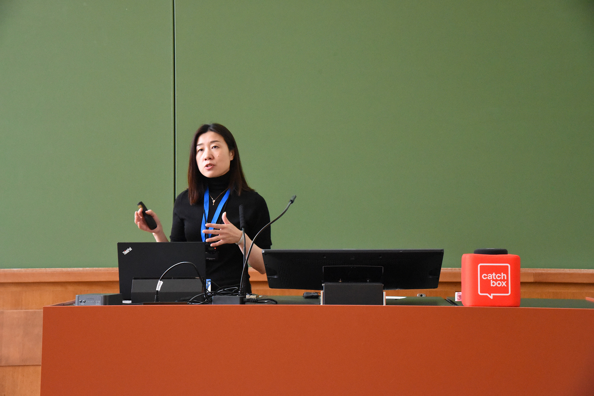 Researcher presenting wireless communications research during a European Wireless conference session.
